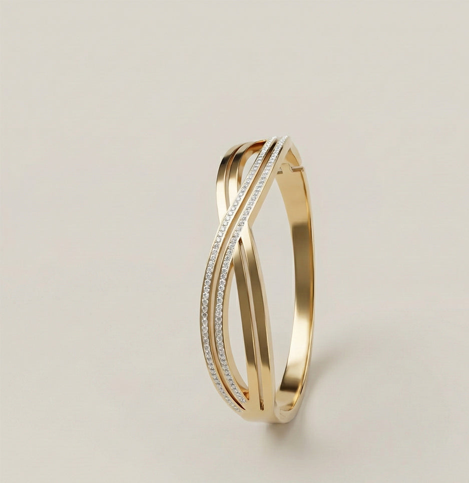 Side view of an anti-tarnish gold infinity cuff bracelet showing the interlocking wave design